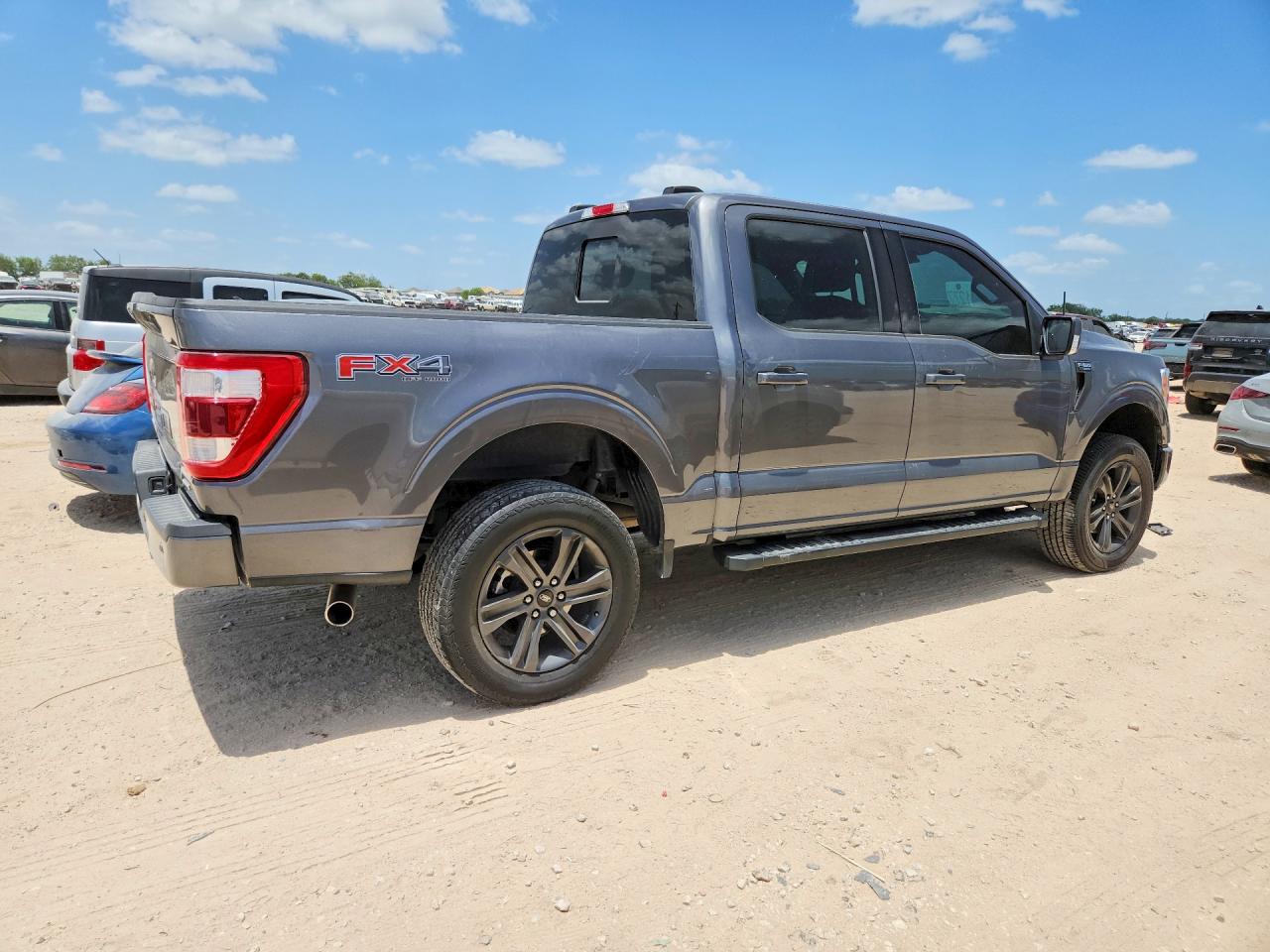 2023 Ford F-150 Lightning VIN 1FTFW1E86PKD71370 COPART salvage auction — Water/Flood, TX - SALVAGE TITLE-FLOOD DAMAGE, sold $26,750 on 2026-08-20 (photo 3)