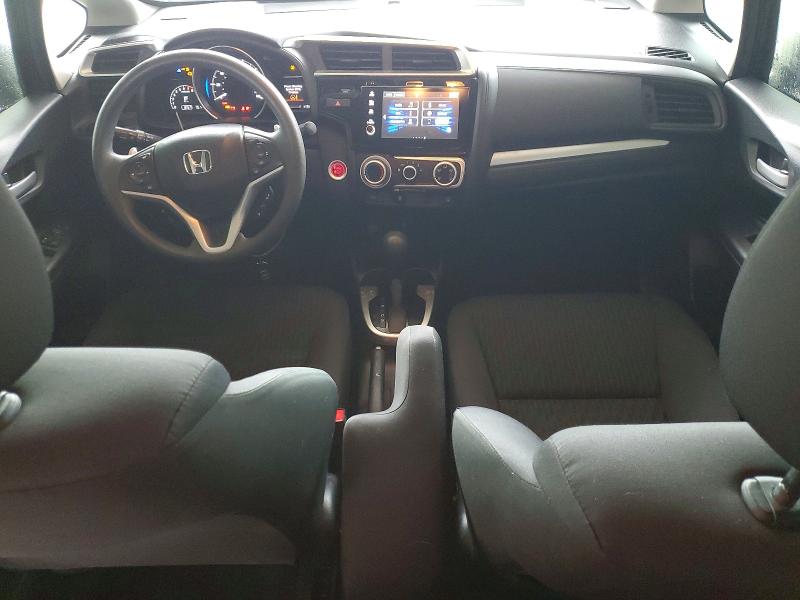 2018 Honda Fit VIN 3HGGK5H89JM719876 COPART salvage auction — WATER/FLOOD, Tx - Salvage Title-Flood Damage, sold $150 on 2026-08-21 (photo 8)