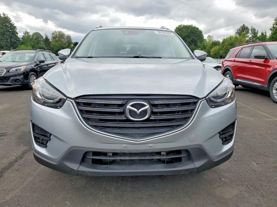 2016 Mazda Cx-5 VIN JM3KE4CY9G0660669 COPART salvage auction — MECHANICAL, Or - Non Public Clean Title, sold $4,700 on 2026-07-06 (photo 5)