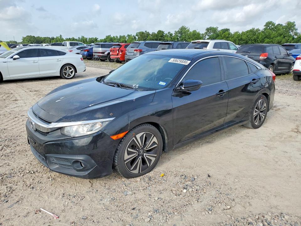 2018 Honda Civic VIN JHMFC1F33JX036460 COPART salvage auction — WATER/FLOOD, Tx - Salvage Title-Flood Damage, sold $150 on 2026-07-24 (photo 1)