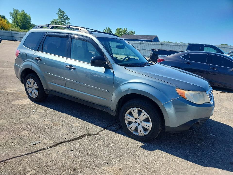 2010 Subaru Forester VIN JF2SH6BC6AH779811 COPART salvage auction — REAR END, MA - CERT OF TITLE-RECONSTRCTD COLL, sold $400 on 2026-07-15 (photo 4)