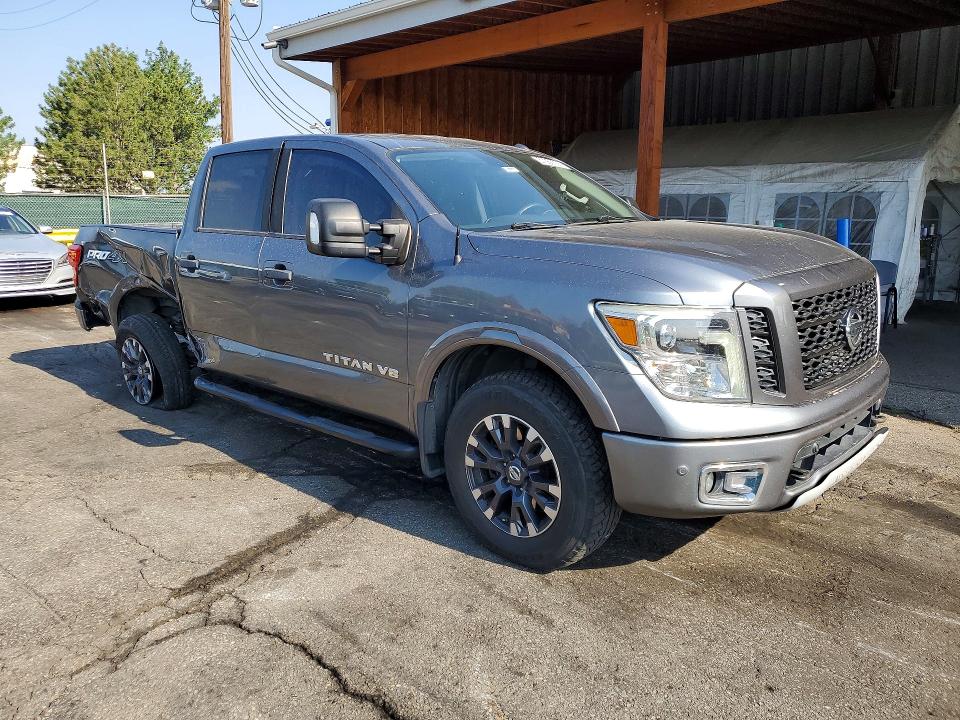 2018 Nissan VIN 1N6AA1E55JN538979 COPART salvage auction — SIDE, Co - Public - Salvage Title, sold $750 on 2026-07-21 (photo 4)