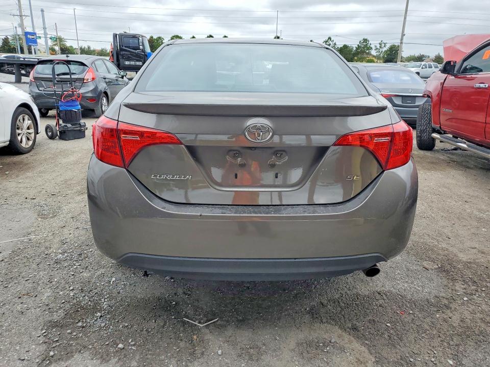 2019 Toyota Corolla VIN 5YFBURHE8KP904883 COPART salvage auction — SIDE, Fl - Cert Of Title Slvg Rebuildable, sold $2,600 on 2026-07-28 (photo 6)