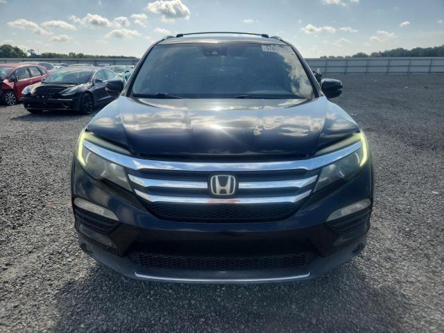 2016 Honda Pilot VIN 5FNYF6H04GB075806 COPART salvage auction — MINOR DENT/SCRATCHES, FL - CERTIFICATE OF TITLE, sold $4,150 on 2026-07-02 (photo 5)