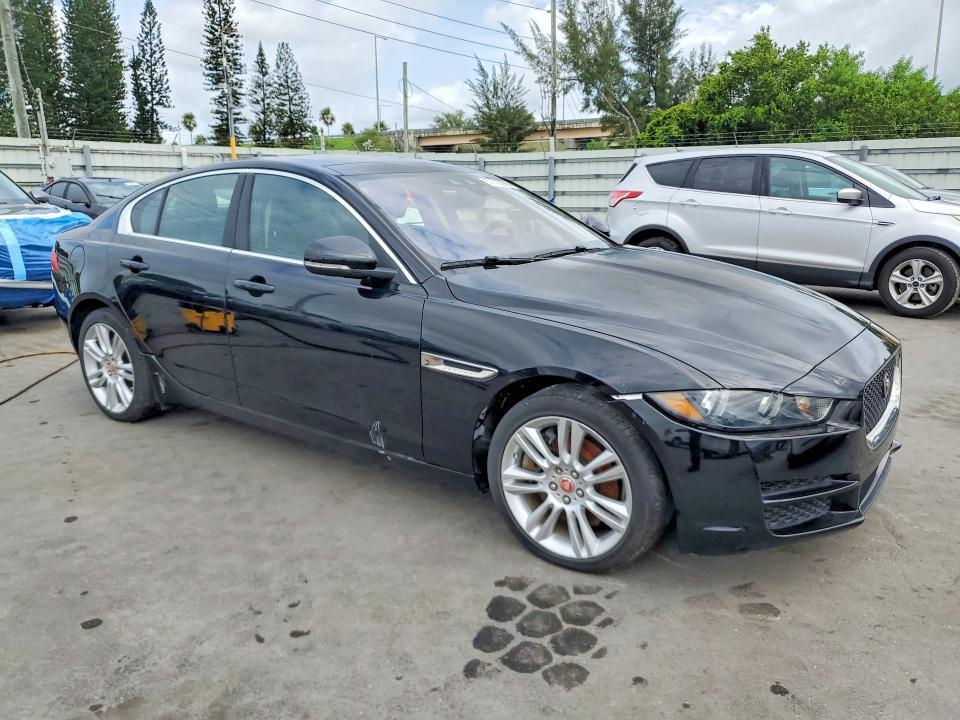 2019 Jaguar Xe VIN SAJAD4FX3KCP46739 COPART salvage auction — WATER/FLOOD, Fl - Cert Of Title-Slvg Rebld Flood, sold $1,000 on 2026-07-29 (photo 4)