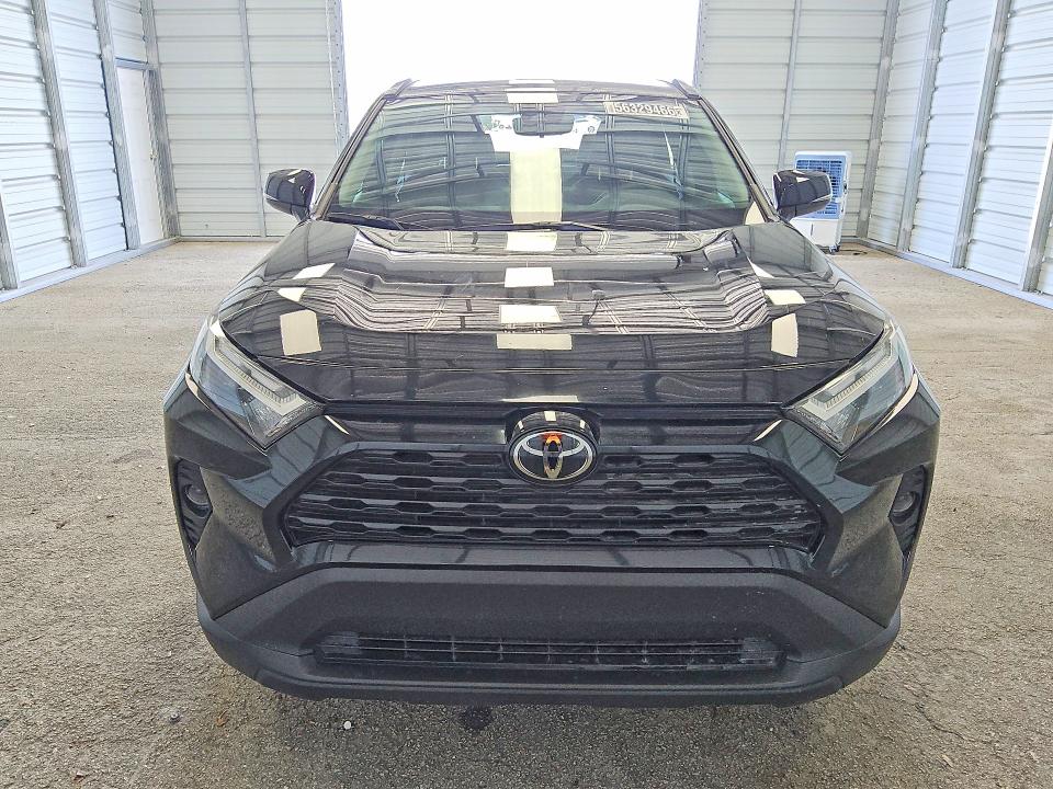 2025 Toyota Rav4 VIN 2T3W1RFV6SC349677 COPART salvage auction — REAR END, Fl - Certificate Of Title, sold $18,000 on 2026-07-07 (photo 5)