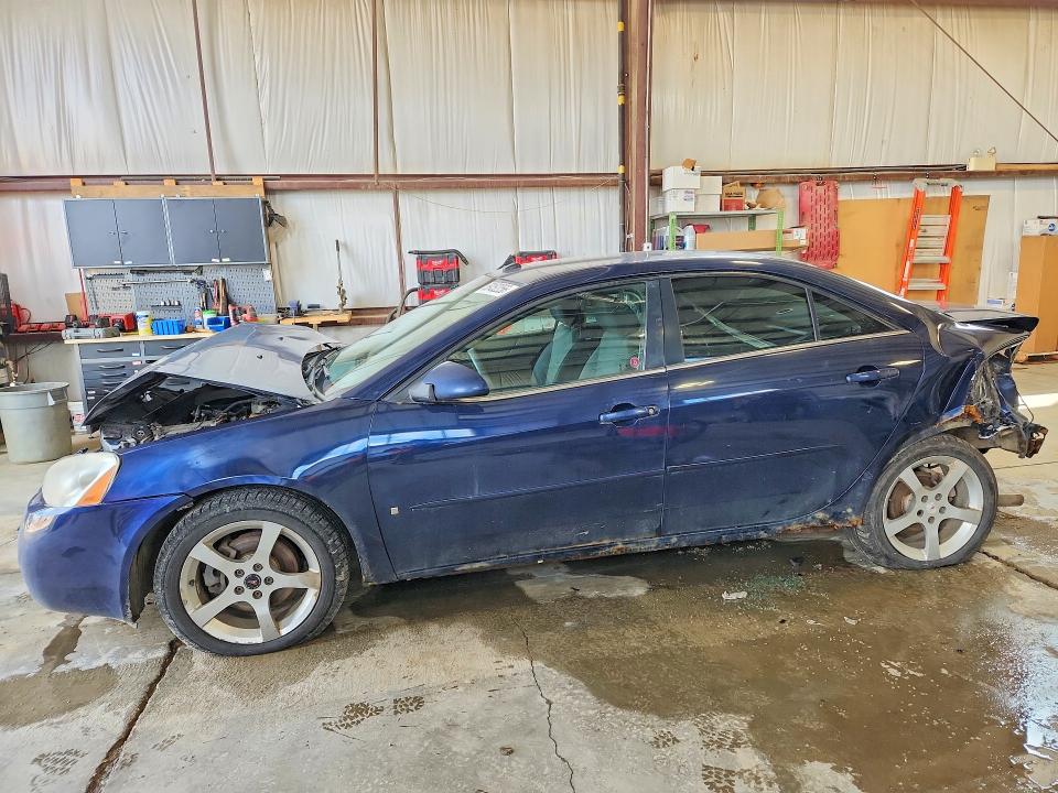 2009 Pontiac G6 VIN 1G2ZJ57B994234933 COPART salvage auction — FRONT END, AB - BOS - SALVAGE, sold $150 on 2026-08-20 (photo 1)