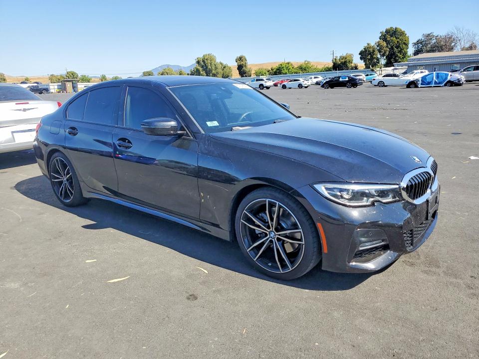 2019 BMW 3 series VIN WBA5R1C50KAK09693 COPART salvage auction — REAR END, CA - SALVAGE CERTIFICATE, sold $13,500 on 2026-08-12 (photo 4)