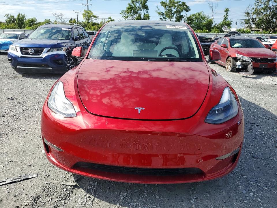 2025 Tesla Model y VIN 7SAYGDEE6SA352627 COPART salvage auction — REAR END, Fl - Cert Of Title Slvg Rebuildable, sold $14,300 on 2026-07-06 (photo 5)