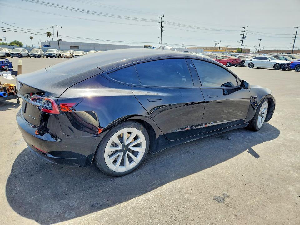 2022 Tesla Model 3 VIN 5YJ3E1EB7NF185073 COPART salvage auction — SIDE, Ca - Salvage Certificate, sold $6,700 on 2026-07-13 (photo 3)