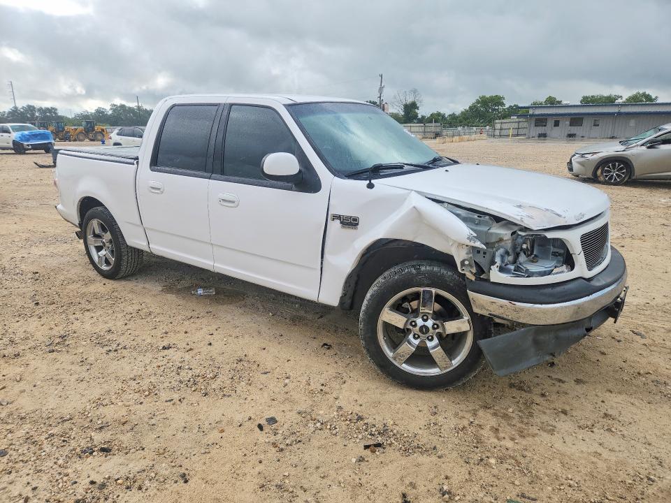 2001 Ford F-150 lightning VIN 1FTRW07L71KB10314 COPART salvage auction — FRONT END, Tx - Salvage Vehicle Title, sold $1,200 on 2026-07-02 (photo 4)