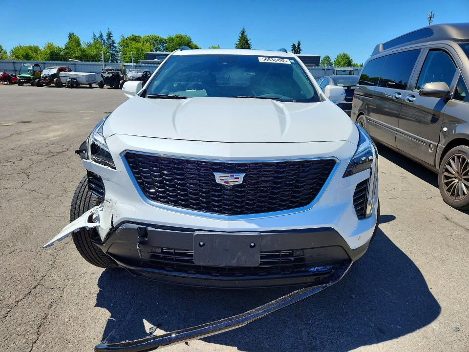 2021 Cadillac Xt4 VIN 1GYFZFR44MF001058 COPART salvage auction — FRONT END, Or - Salvage Title Certificate, sold $3,600 on 2026-08-17 (photo 5)