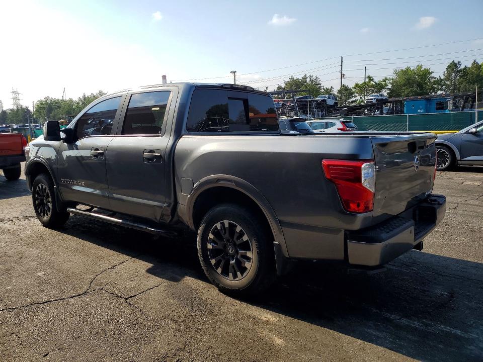 2018 Nissan VIN 1N6AA1E55JN538979 COPART salvage auction — SIDE, Co - Public - Salvage Title, sold $6,300 on 2026-07-28 (photo 2)