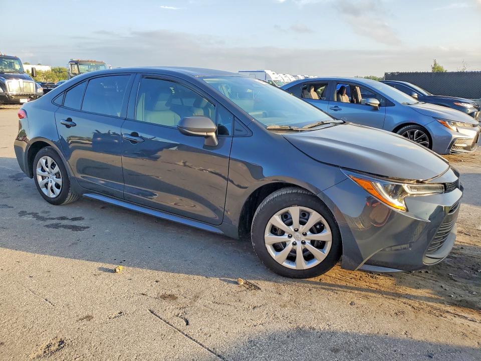 2025 Toyota Corolla VIN 5YFB4MDE0SP334757 COPART salvage auction — WATER/FLOOD, Fl - Certificate Of Destruction, sold $4,050 on 2026-07-28 (photo 4)