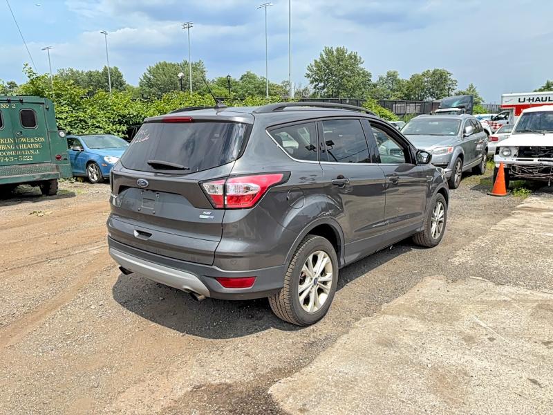 2018 Ford Escape VIN 1FMCU9GD9JUD12743 COPART salvage auction — NORMAL WEAR, Nj - Certificate Of Title (P), sold $2,950 on 2026-07-19 (photo 4)