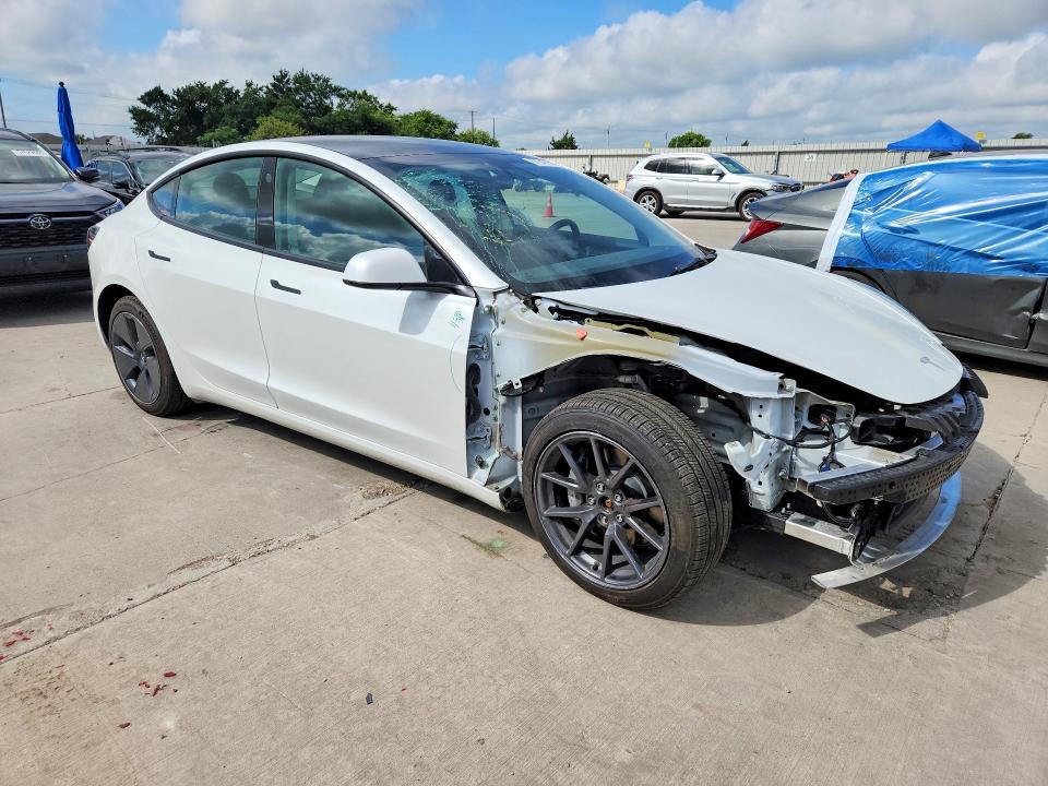2022 Tesla Model 3 VIN 5YJ3E1EB1NF152439 COPART salvage auction — FRONT END, TX - SALVAGE VEHICLE TITLE, sold $11,300 on 2026-07-06 (photo 4)