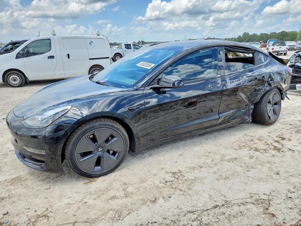 2023 Tesla Model 3 VIN 5YJ3E1EA4PF460120 — COPART salvage auction photo