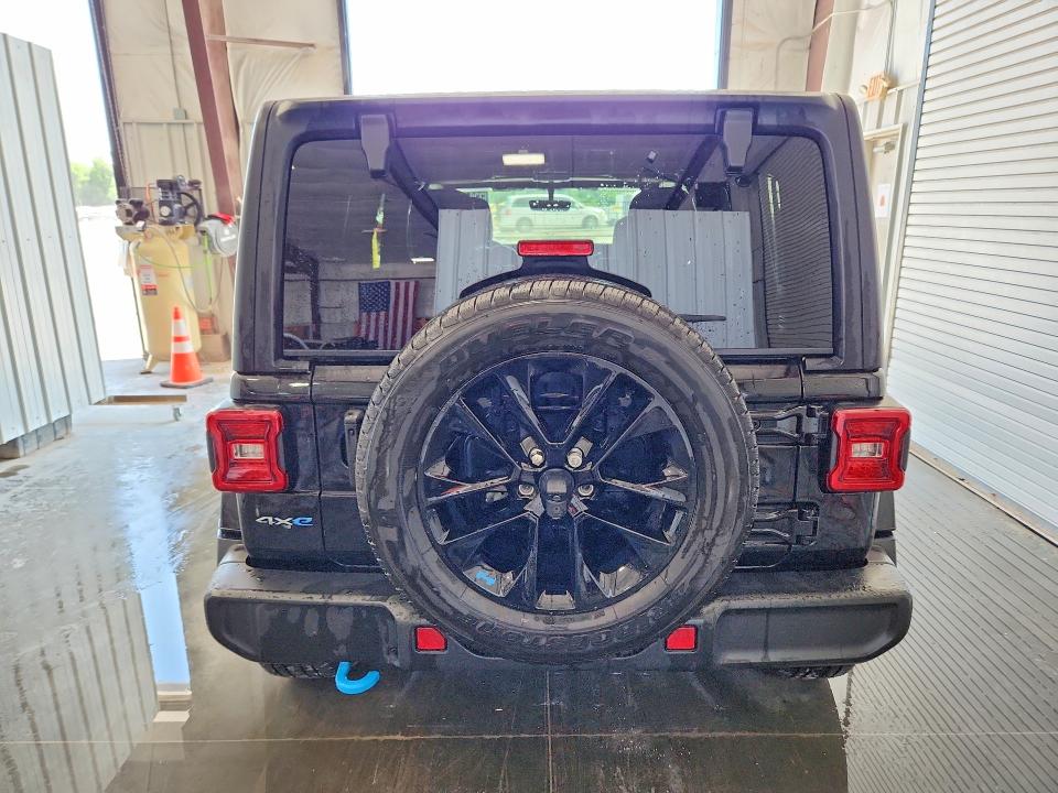 2023 Jeep Wrangler / VIN 1C4JJXP64PW556775 COPART salvage auction — MINOR DENT/SCRATCHES, Mo - Certificate Of Title, sold $22,250 on 2026-07-02 (photo 6)