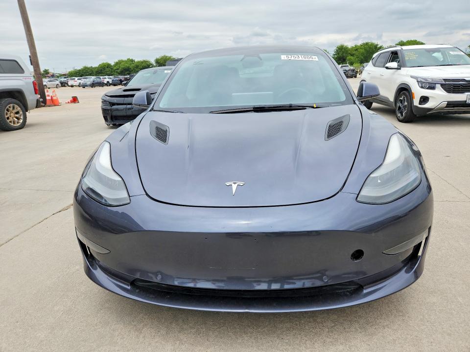 2021 Tesla Model 3 VIN 5YJ3E1EA7MF093886 COPART salvage auction — NORMAL WEAR, Tx - Cert Of Title-Rebuilt Salvage (P), sold $12,600 on 2026-07-30 (photo 5)