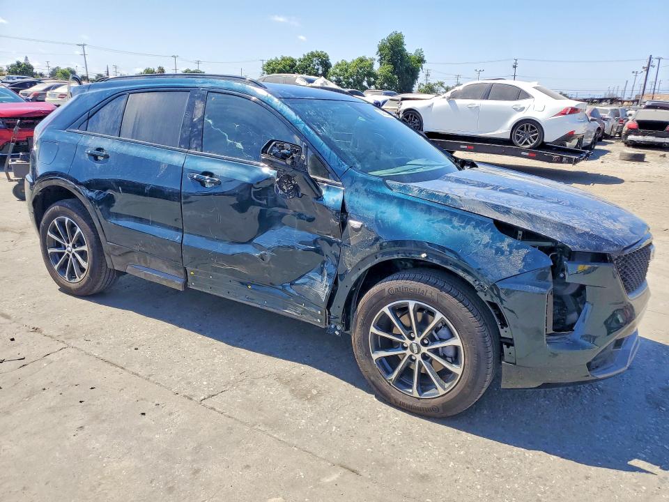 2025 Cadillac Xt4 VIN 1GYFZER46SF159327 COPART salvage auction — SIDE, Az - Dis/Dlr/Exp Only Salvage Title, sold $10,500 on 2026-07-29 (photo 4)
