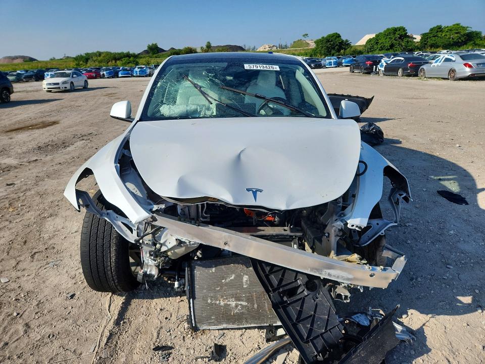 2023 Tesla Model y VIN 7SAYGAEE8PF933944 COPART salvage auction — FRONT END, Fl - Certificate Of Destruction, sold $8,400 on 2026-09-01 (photo 5)
