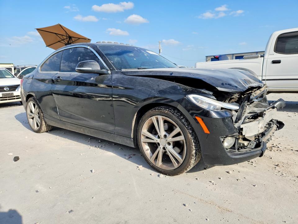 2015 BMW 2er VIN WBA1F5C58FV257391 COPART salvage auction — FRONT END, TX - SALVAGE VEHICLE TITLE, sold $1,150 on 2026-07-31 (photo 4)