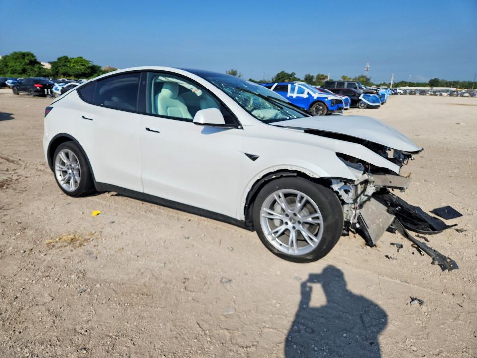 2023 Tesla Model y VIN 7SAYGAEE8PF933944 COPART salvage auction — FRONT END, Fl - Certificate Of Destruction, sold $8,400 on 2026-09-01 (photo 4)