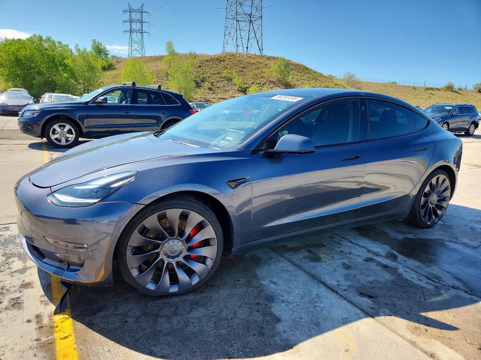 2022 Tesla VIN 5YJ3E1EC6NF277798 COPART salvage auction — FRONT END, CO - PUBLIC - SALVAGE TITLE, sold $10,100 on 2026-07-20 (photo 1)