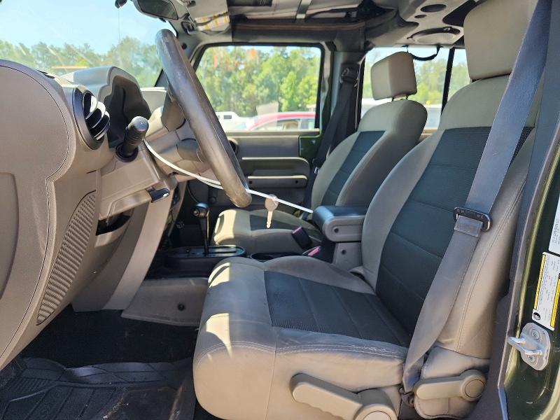 2009 Jeep Wrangler / VIN 1J4GB39179L753990 COPART salvage auction — FRONT END, GA - CERT OF TITLE-SALVAGE, sold $1,500 on 2026-08-02 (photo 7)