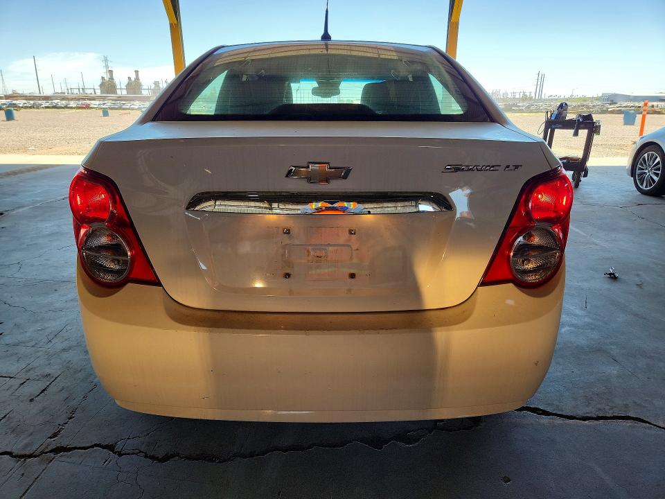 2013 Chevrolet SONIC VIN 1G1JC5SG9D4165491 COPART salvage auction — NORMAL WEAR, AZ - CERTIFICATE OF TITLE, sold $1,350 on 2026-07-08 (photo 6)
