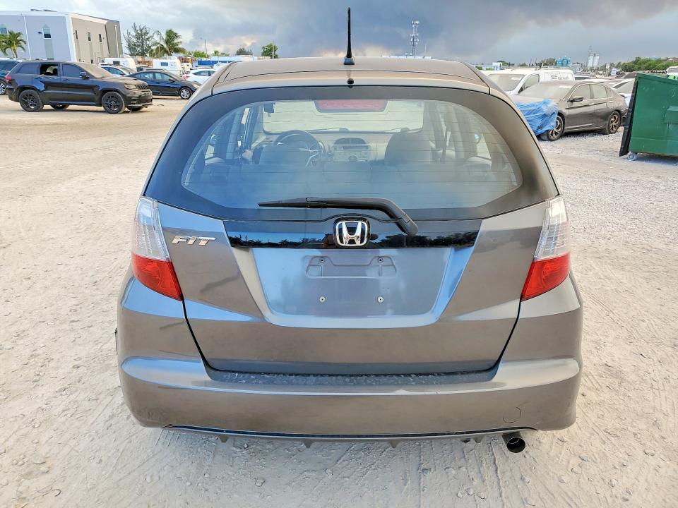 2013 Honda Fit VIN JHMGE8H35DC021104 COPART salvage auction — SIDE, Fl - Cert Of Title Slvg Rebuildable, sold $1,550 on 2026-07-14 (photo 6)