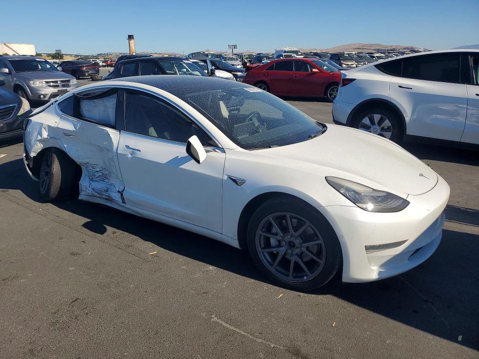 2019 Tesla Model 3 VIN 5YJ3E1EB4KF433369 COPART salvage auction — SIDE, Ca - Salvage Certificate, sold $3,550 on 2026-07-22 (photo 4)