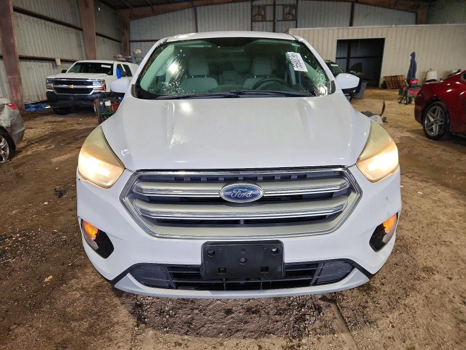 2017 Ford Escape VIN 1FMCU0GD5HUB42662 COPART salvage auction — SIDE, Tx - Salvage Vehicle Title, sold $1,750 on 2026-07-02 (photo 5)
