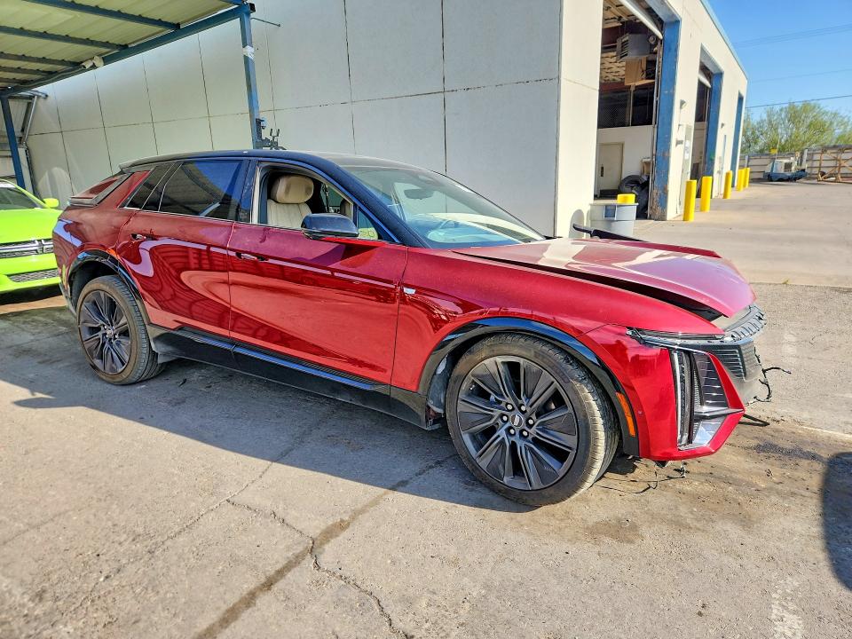 2024 Cadillac Lyriq VIN 1GYKPWRL4RZ135022 COPART salvage auction — ALL OVER, Tx - Salvage Vehicle Title, sold $13,300 on 2026-08-21 (photo 4)