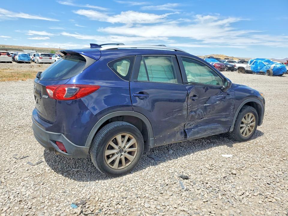 2014 Mazda Cx-5 VIN JM3KE2BE6E0385464 COPART salvage auction — SIDE, Ut - Salvage Certificate, sold $2,050 on 2026-07-24 (photo 3)
