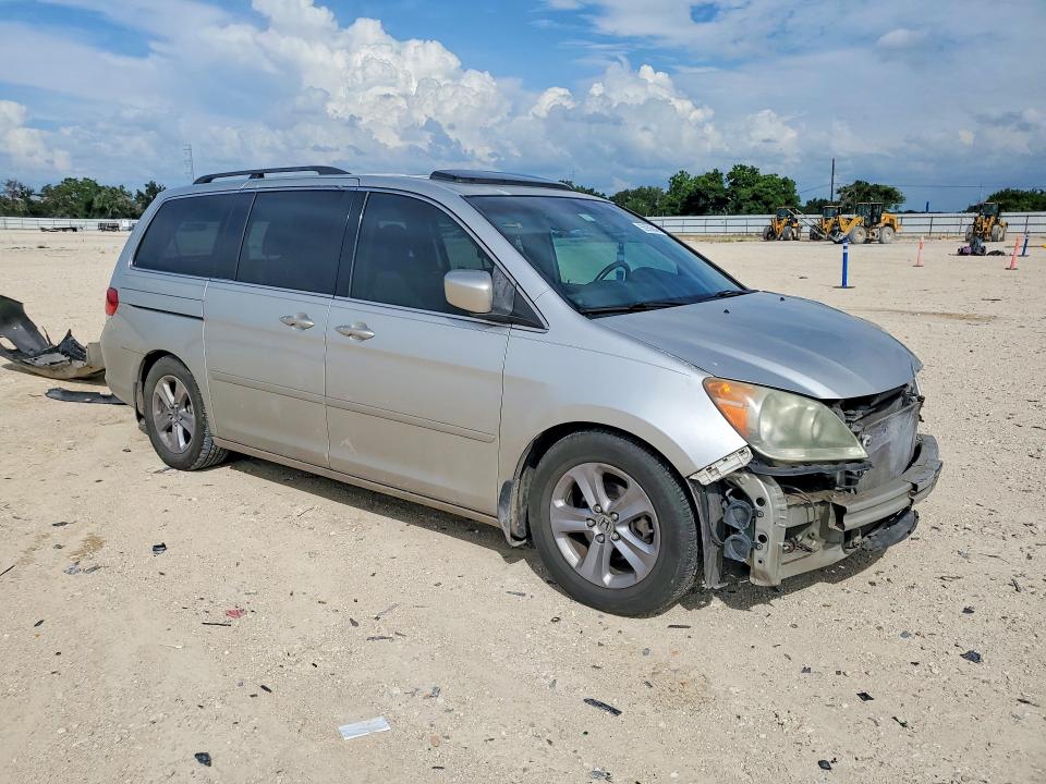 2009 Honda Odyssey VIN 5FNRL38999B012648 COPART salvage auction — FRONT END, Tx - Salvage Vehicle Title, sold $525 on 2026-07-09 (photo 4)