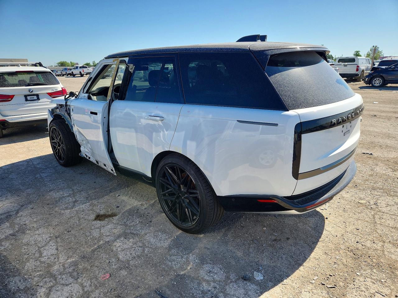 2023 Land Rover Range Rover VIN SALKP9FUXPA028453 COPART salvage auction — Side, IN - CERT OF TITLE-SALVAGE TITLE, sold $51,500 on 2026-07-07 (photo 2)