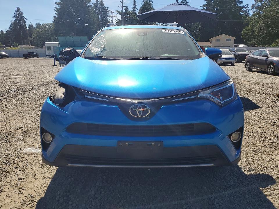 2018 Toyota Rav 4 VIN JTMRFREV1JJ192183 COPART salvage auction — SIDE, Salvage Title, sold $450 on 2026-07-21 (photo 5)