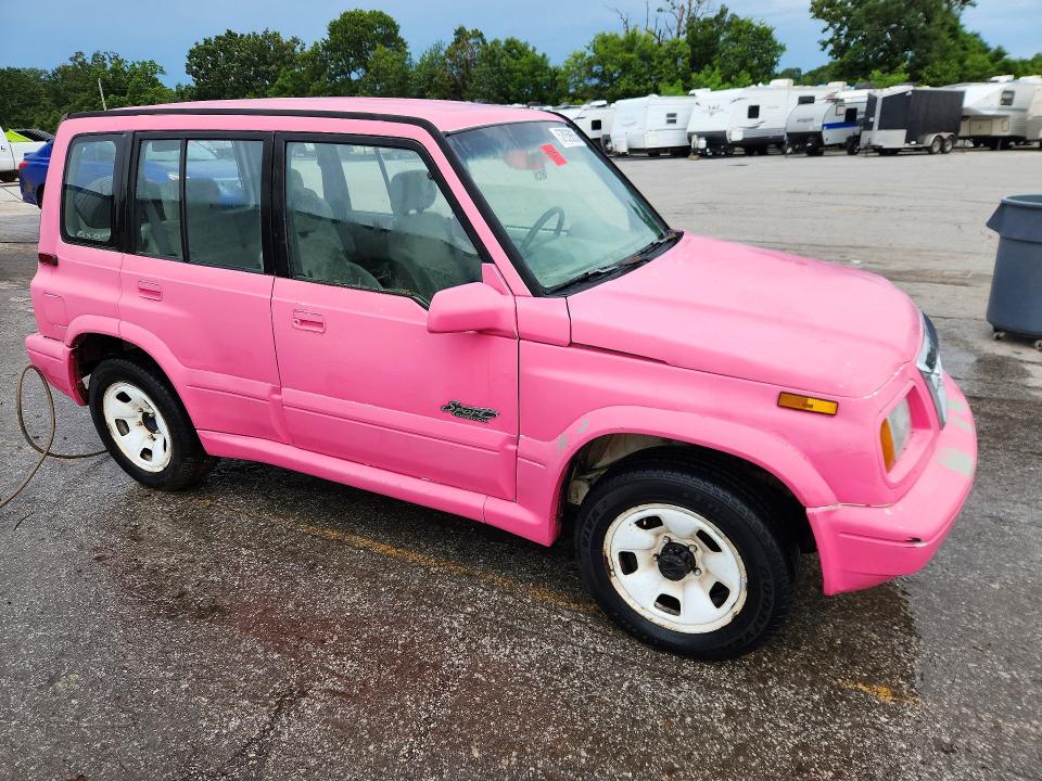 1998 Suzuki Sidekick VIN JS3TD21V3W4109675 COPART salvage auction — HAIL, Mo - Salvage Certificate Of Title, sold $300 on 2026-07-20 (photo 4)