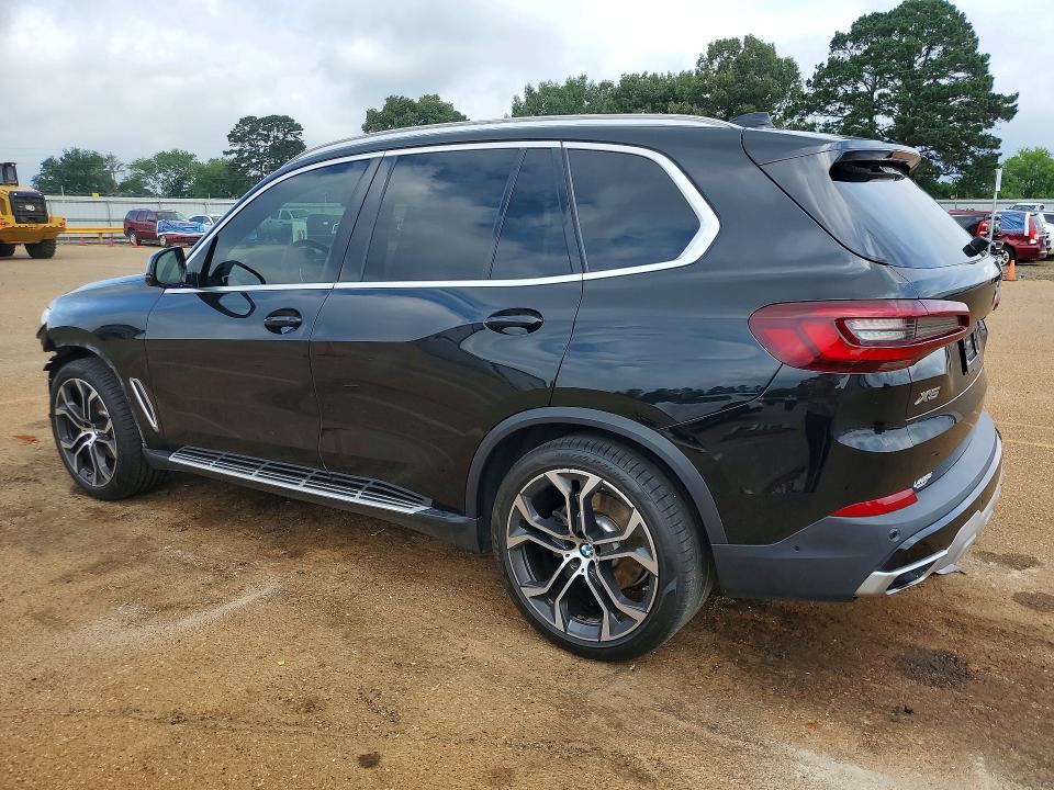 2021 BMW VIN 5UXCR4C00M9E64172 COPART salvage auction — SIDE, TX - SALVAGE VEHICLE TITLE (P), sold $1,550 on 2026-07-27 (photo 2)