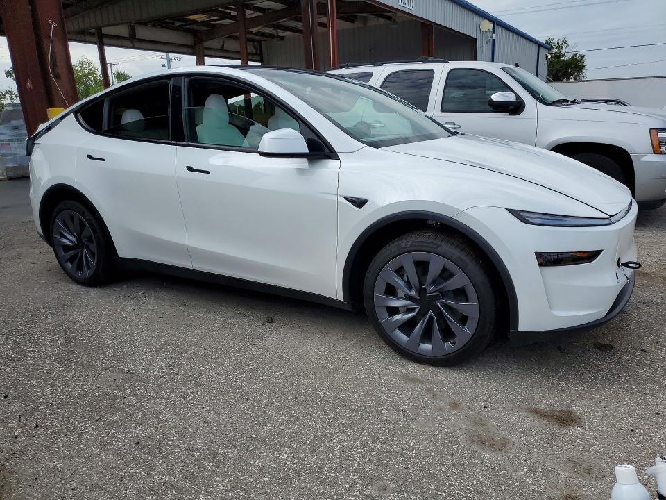 2026 Tesla Model y VIN 7SAYGDED3TA651775 COPART salvage auction — REAR END, FL - CERT OF TITLE SLVG REBUILDABLE, sold $22,700 on 2026-07-31 (photo 4)
