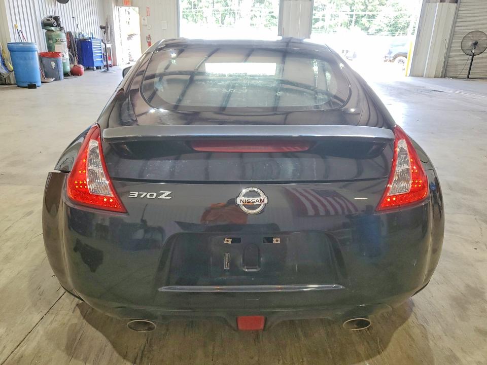 2015 Nissan VIN JN1AZ4EH3FM443067 COPART salvage auction — FRONT END, Tx - Salvage Vehicle Title, sold $3,200 on 2026-07-20 (photo 6)