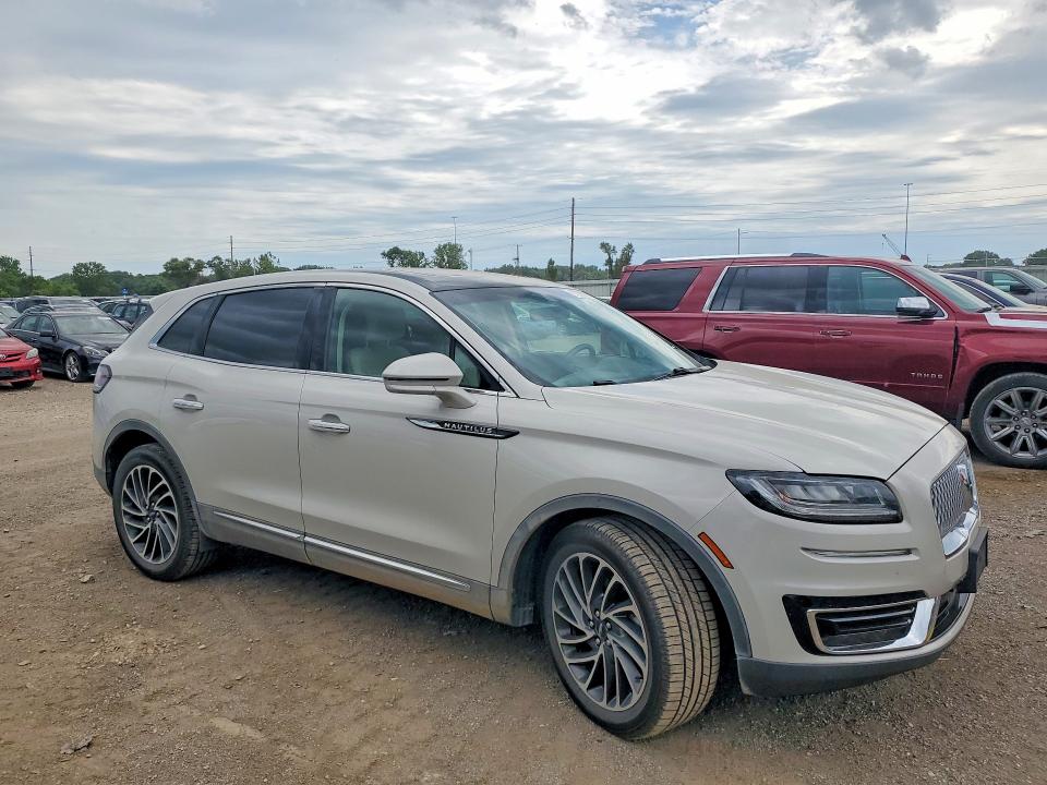 2019 Lincoln Nautilus VIN 2LMPJ8LP4KBL16375 COPART salvage auction — HAIL, IA - CERT OF TITLE-SALVAGE TITLE, sold $11,600 on 2026-07-31 (photo 4)