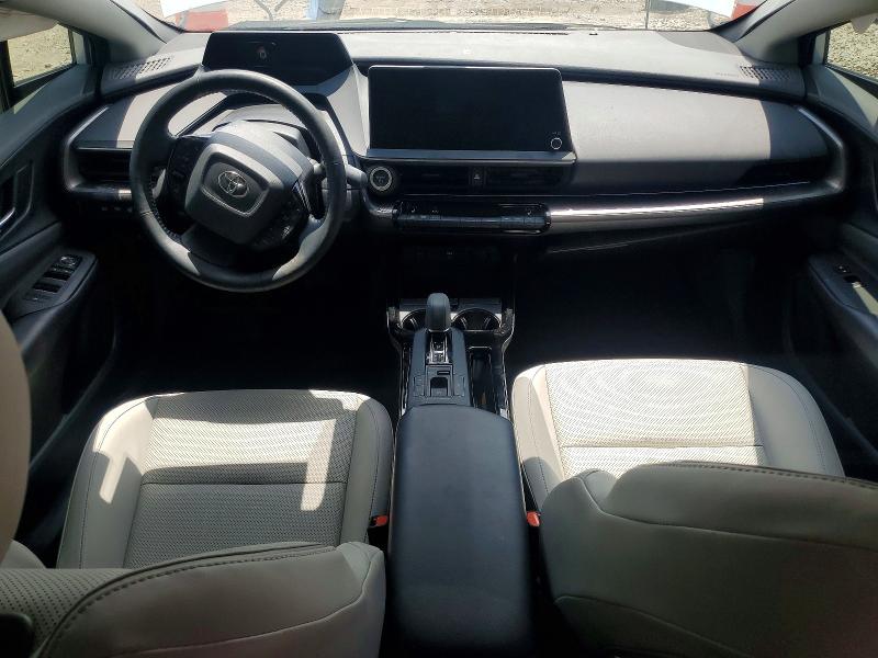 2023 Toyota Prius VIN JTDACAAU0P3011687 COPART salvage auction — SIDE, TX - SALVAGE VEHICLE TITLE (P), sold $7,000 on 2026-07-23 (photo 8)