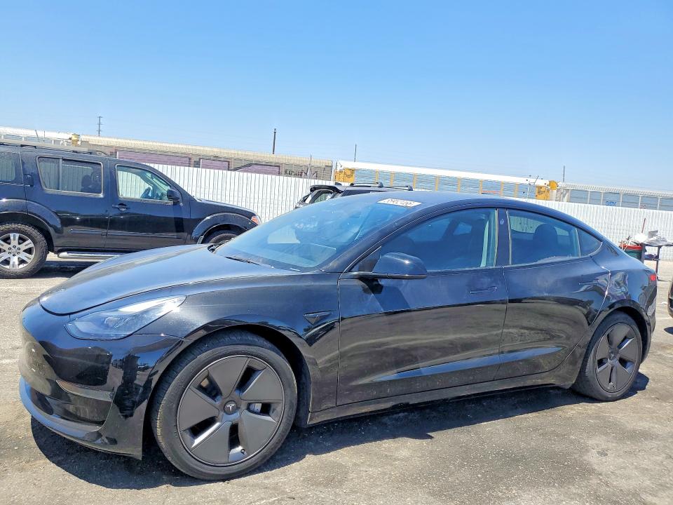 2023 Tesla Model 3 VIN 5YJ3E1EA4PF432625 — COPART salvage auction photo