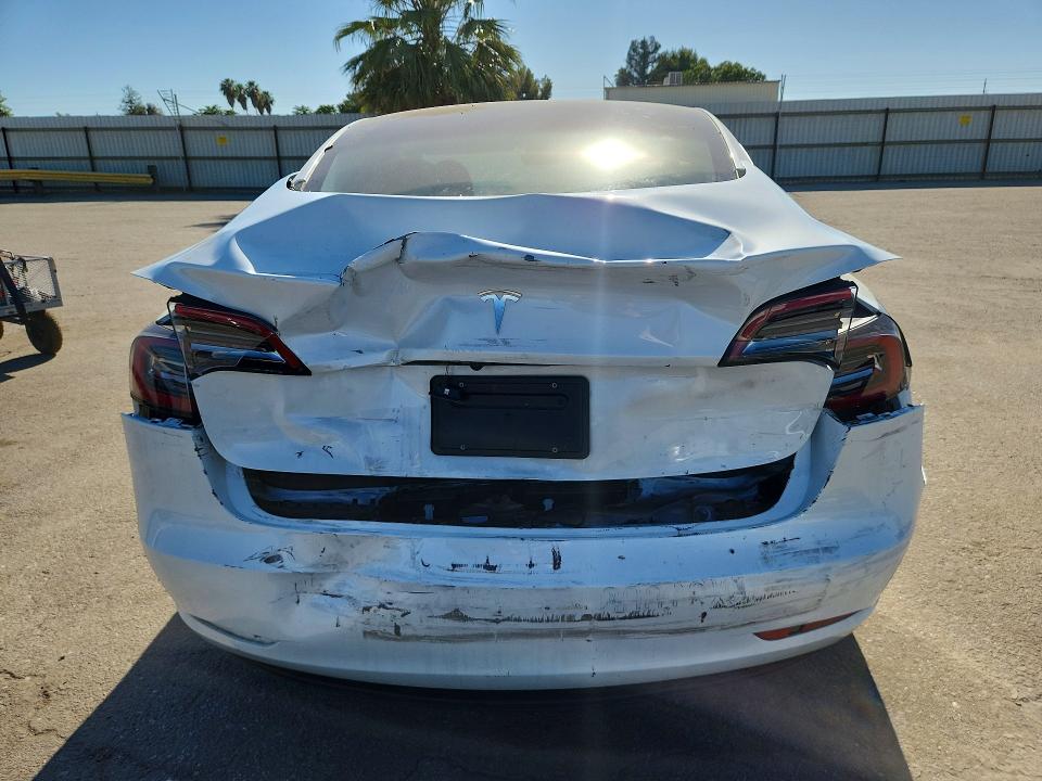 2023 Tesla Model 3 VIN 5YJ3E1EA6PF583983 COPART salvage auction — REAR END, CA - SALVAGE CERTIFICATE, sold $225 on 2026-07-24 (photo 6)