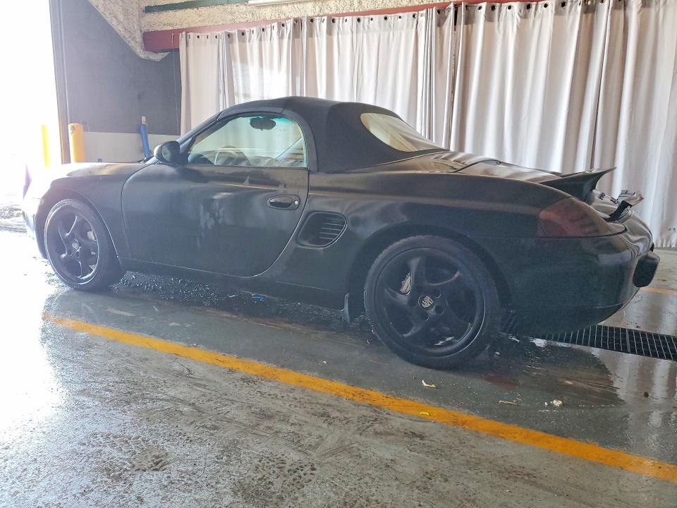 1999 Porsche Boxster VIN WP0CA2985XU629545 COPART salvage auction — NORMAL WEAR, In - Cert Of Title - Rebuilt Vehicl, sold $1,300 on 2026-08-04 (photo 2)