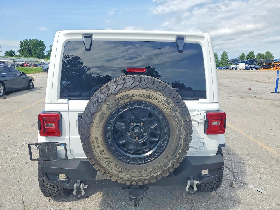 2023 Jeep Wrangler / VIN 1C4JJXR62PW513923 COPART salvage auction — MINOR DENT/SCRATCHES, MO - CERTIFICATE OF TITLE, sold $18,200 on 2026-07-09 (photo 6)