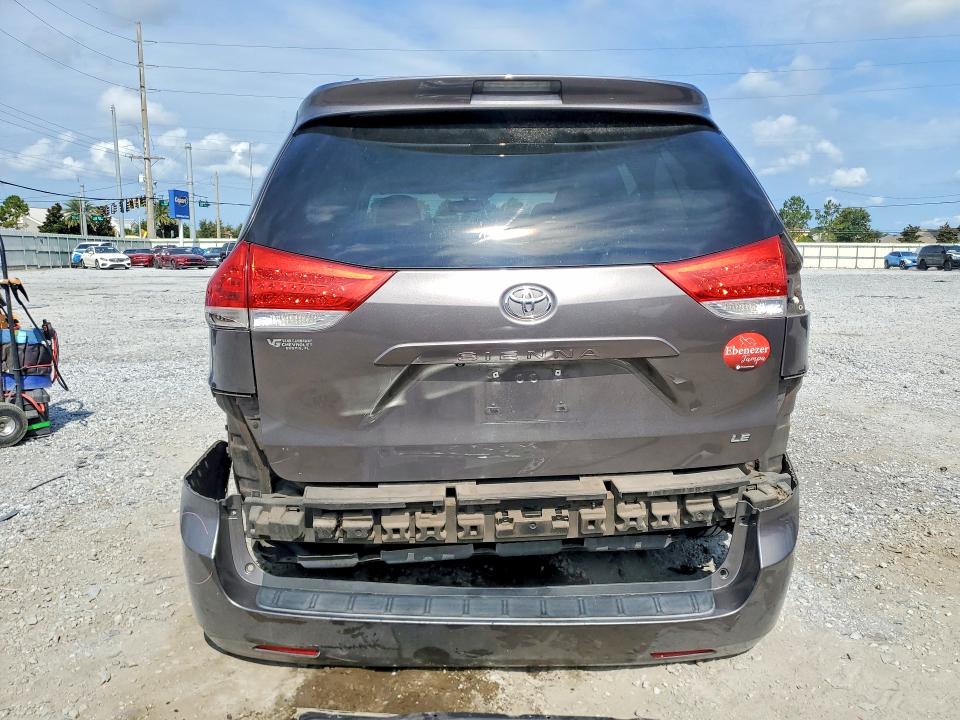 2014 Toyota Sienna VIN 5TDKK3DC7ES485511 COPART salvage auction — SIDE, FL - CERT OF TITLE SLVG REBUILDABLE, sold $1,450 on 2026-07-10 (photo 6)