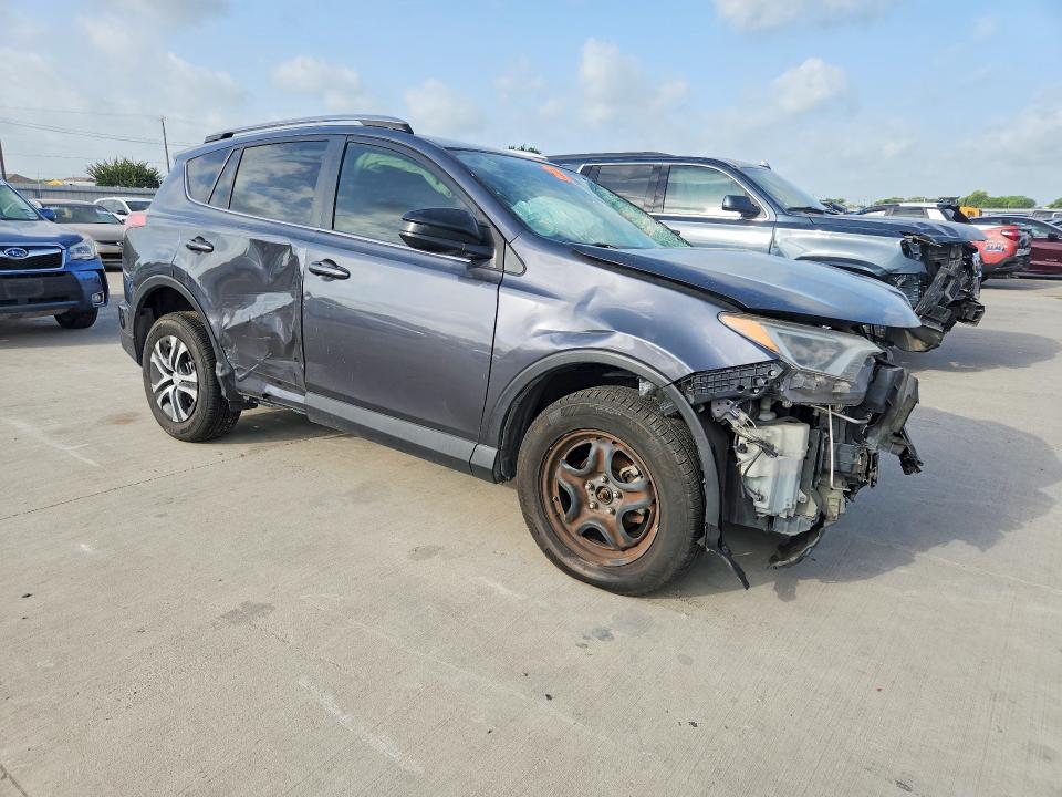 2017 Toyota Rav 4 VIN JTMZFREV5HD094654 COPART salvage auction — SIDE, TX - SALVAGE VEHICLE TITLE (P), sold $1,800 on 2026-07-23 (photo 4)